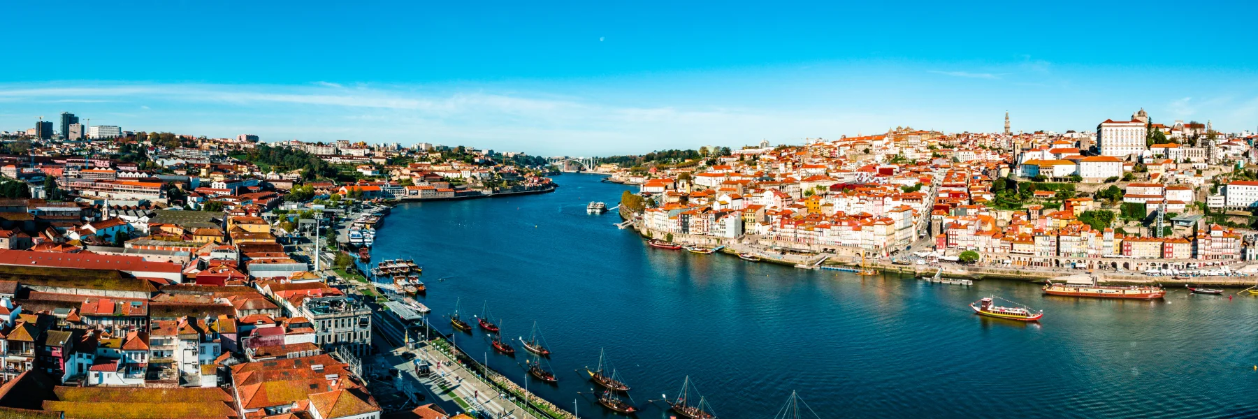 Explore Porto, Portugal, a charming riverside city famed for port wine, historic streets, and stunning views